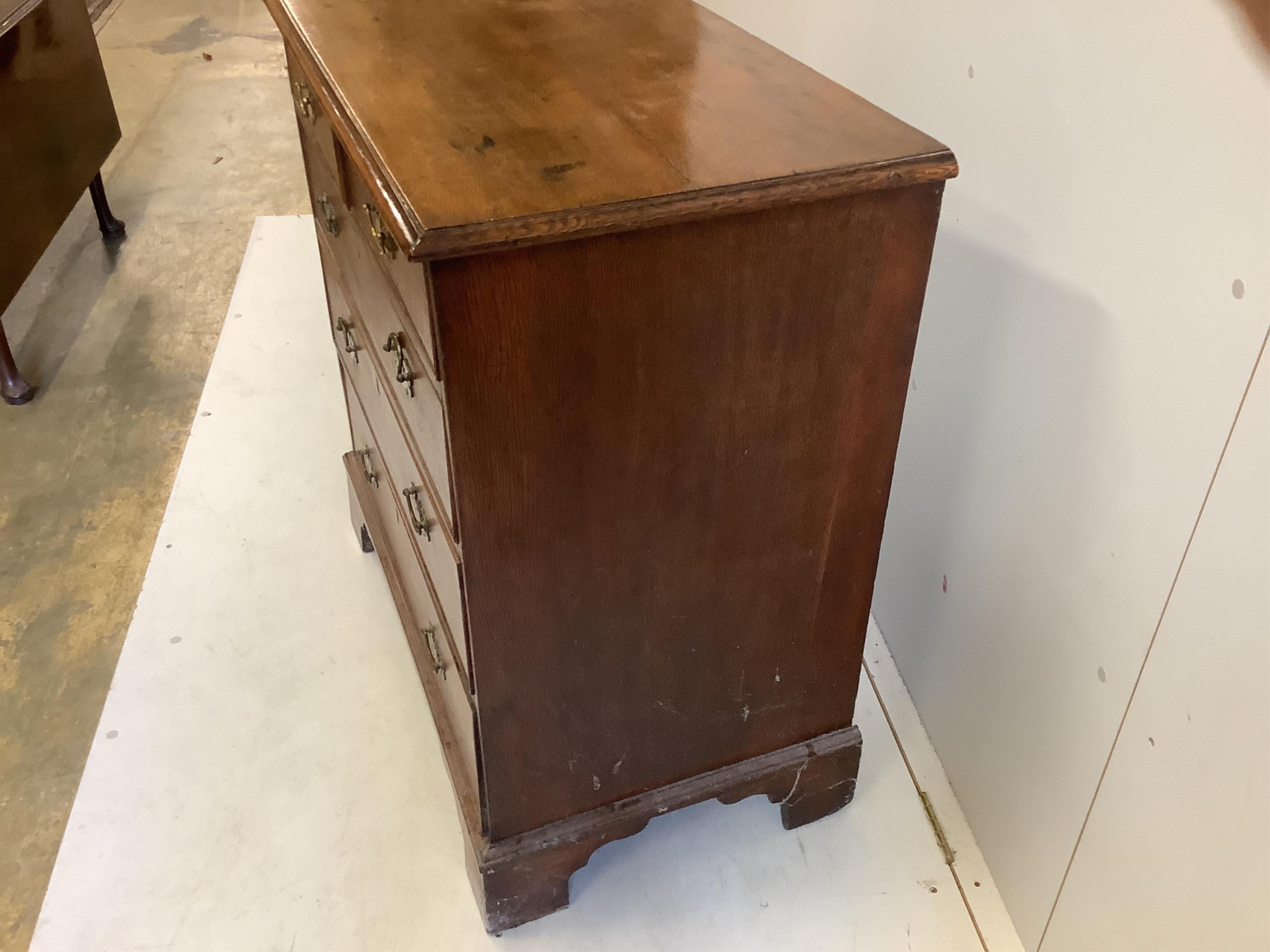 An early 18th century oak chest, fitted with two short and two long drawers, width 91cm, depth 51cm, height 94cm. Condition - fair